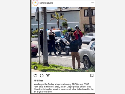 San Diego Cop Holds Child at Gunpoint